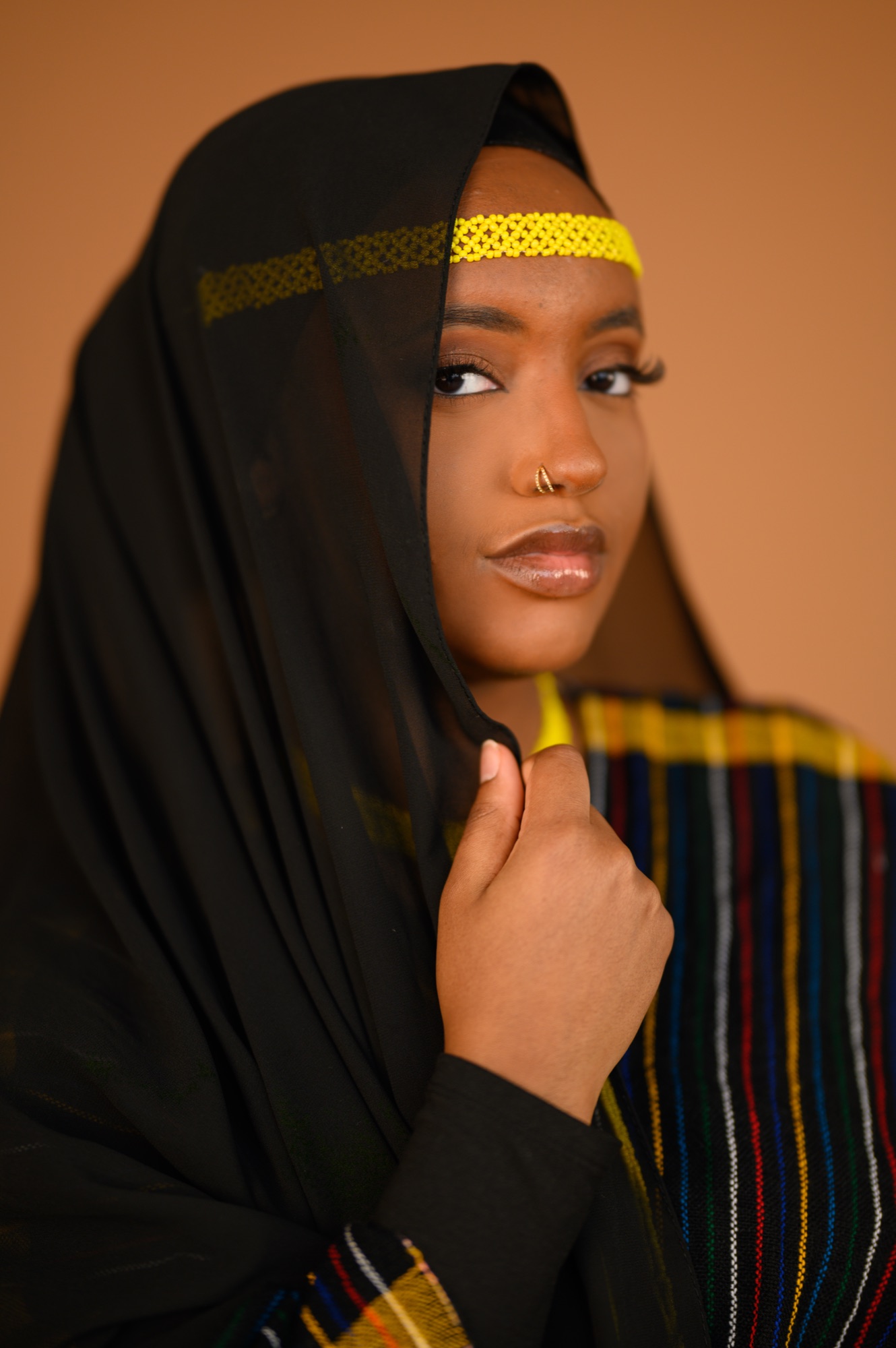 Portrait of Faaya Adem in Oromo aadaa dress and callee