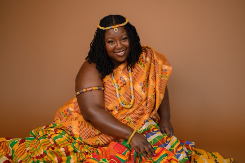 Portrait of Shika Kalevor in kente cloth